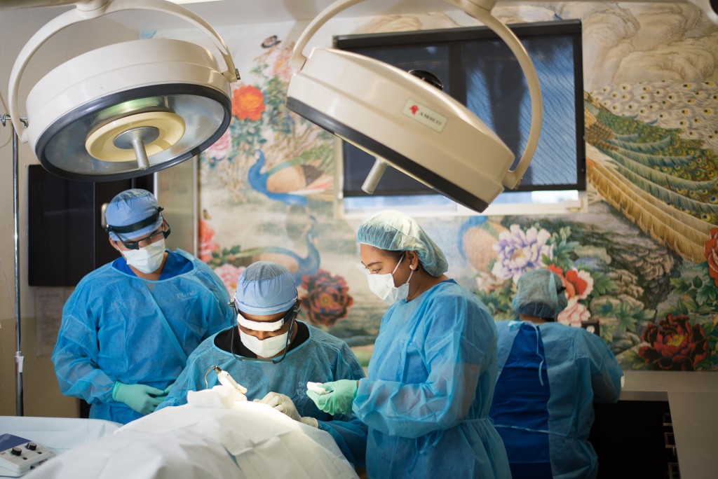 The operating room in Dr U is a comfortable setting. Patient is face down in an ergonomically sensitive operating table with Dr U personally extracting all the grafts The operating room in Dr U is a comfortable setting. Patient is face down in an ergonomically sensitive operating table with Dr U personally extracting all the grafts