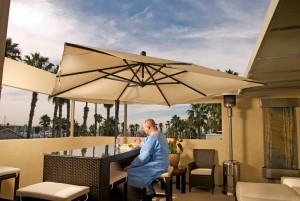 HT patient having lunch on the clinic pent house floor patio with a view of the ocean/the marina